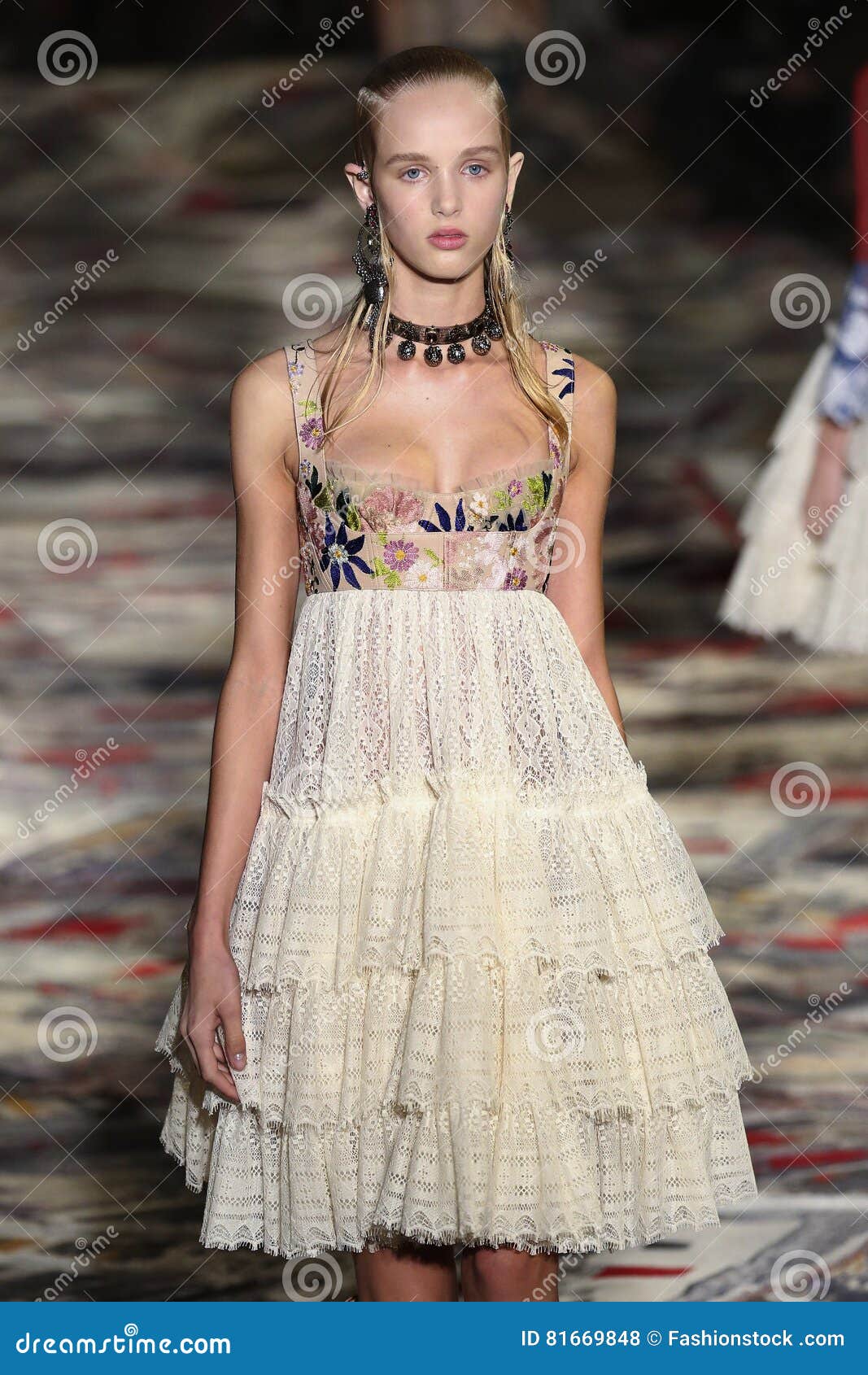 A Model Walks the Runway during the Alexander McQueen Designed by Sarah ...