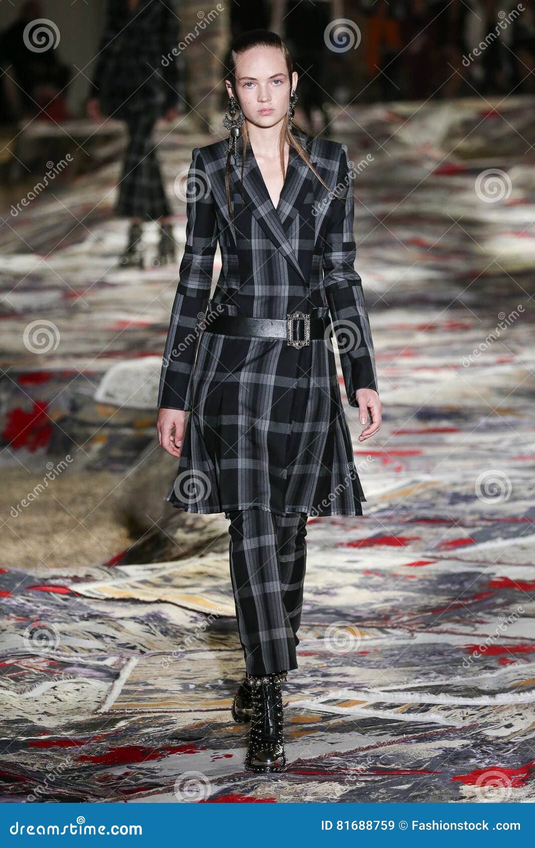 A Model Walks the Runway during the Alexander McQueen Designed by Sarah ...