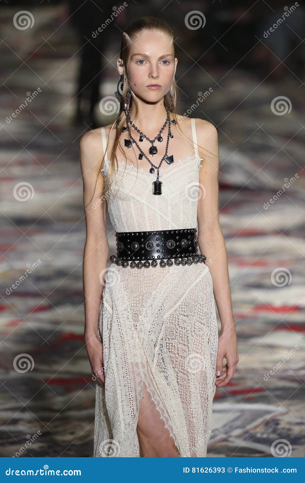 A Model Walks the Runway during the Alexander McQueen Designed by Sarah ...