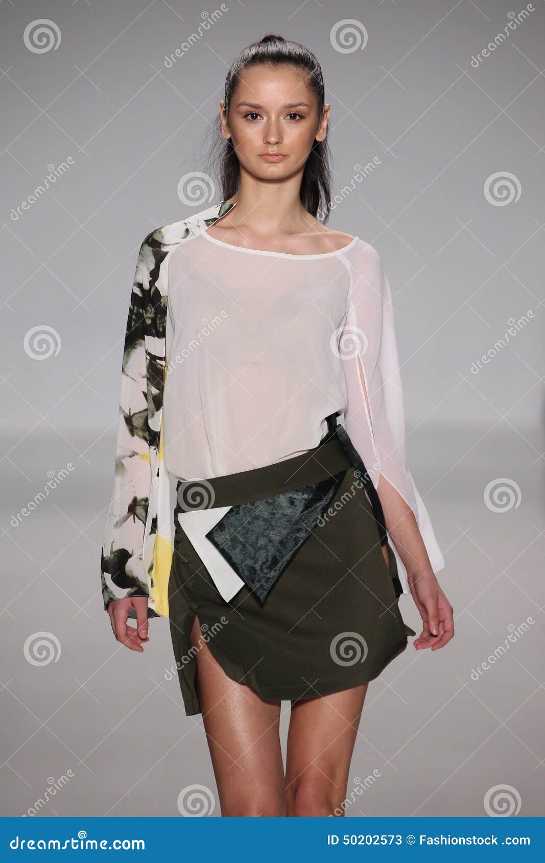 A Model Walks the Runway during the Charity Water Fashion Show ...