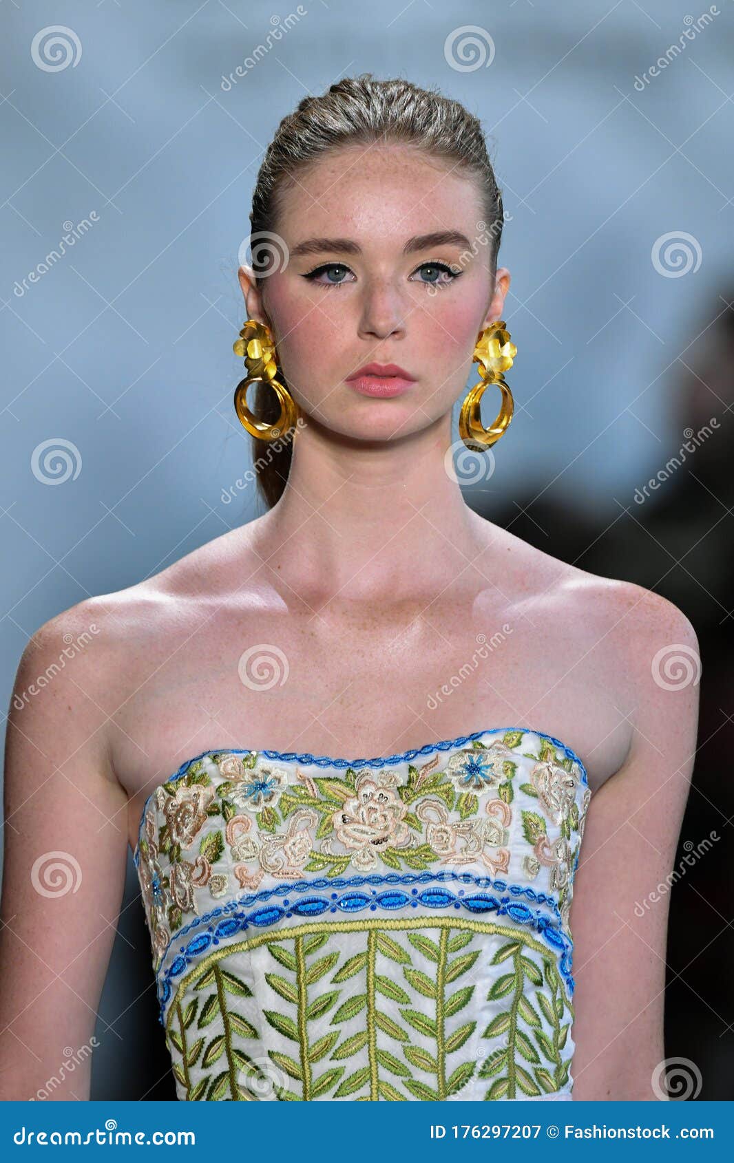 A Model Walks the Runway for Dennis Basso during New York Fashion Week ...