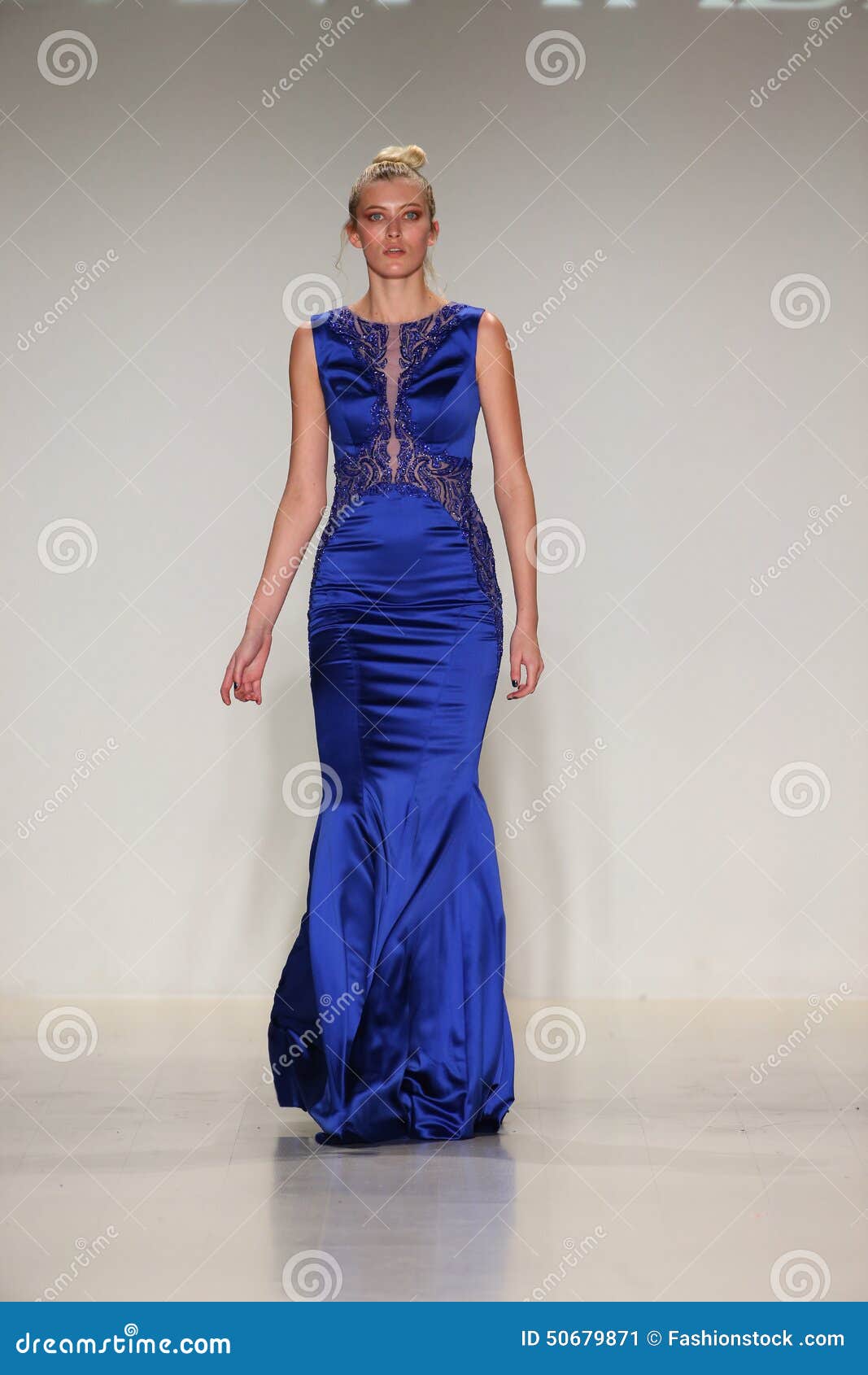 A Model Walks the Runway in a Design by Dany Tabet at the New York Life ...