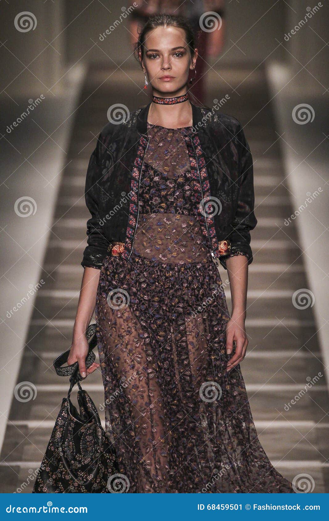 Model walks on the runway during the Etro Fashion Show during