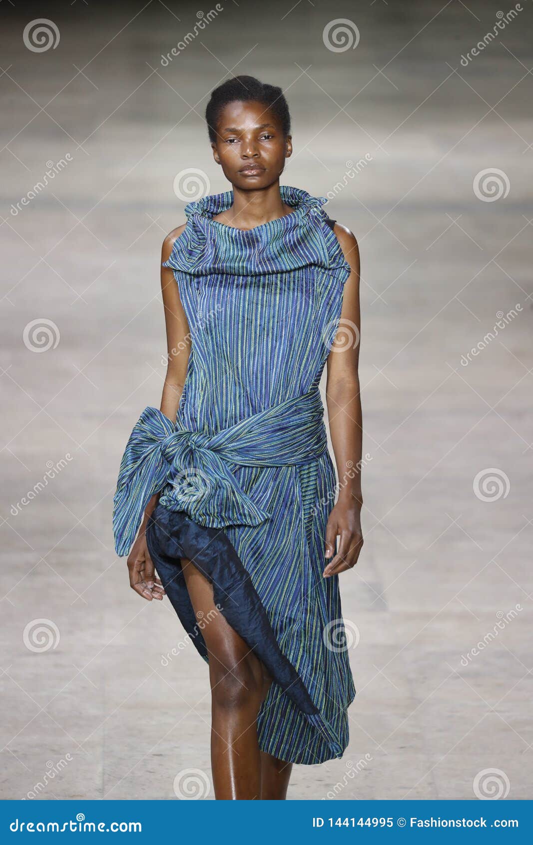 A Model Walks The Runway During The Issey Miyake Show As ...