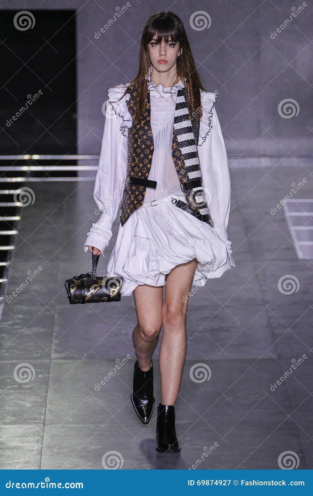 Model walks on the runway during the Louis Vuitton Fashion Show