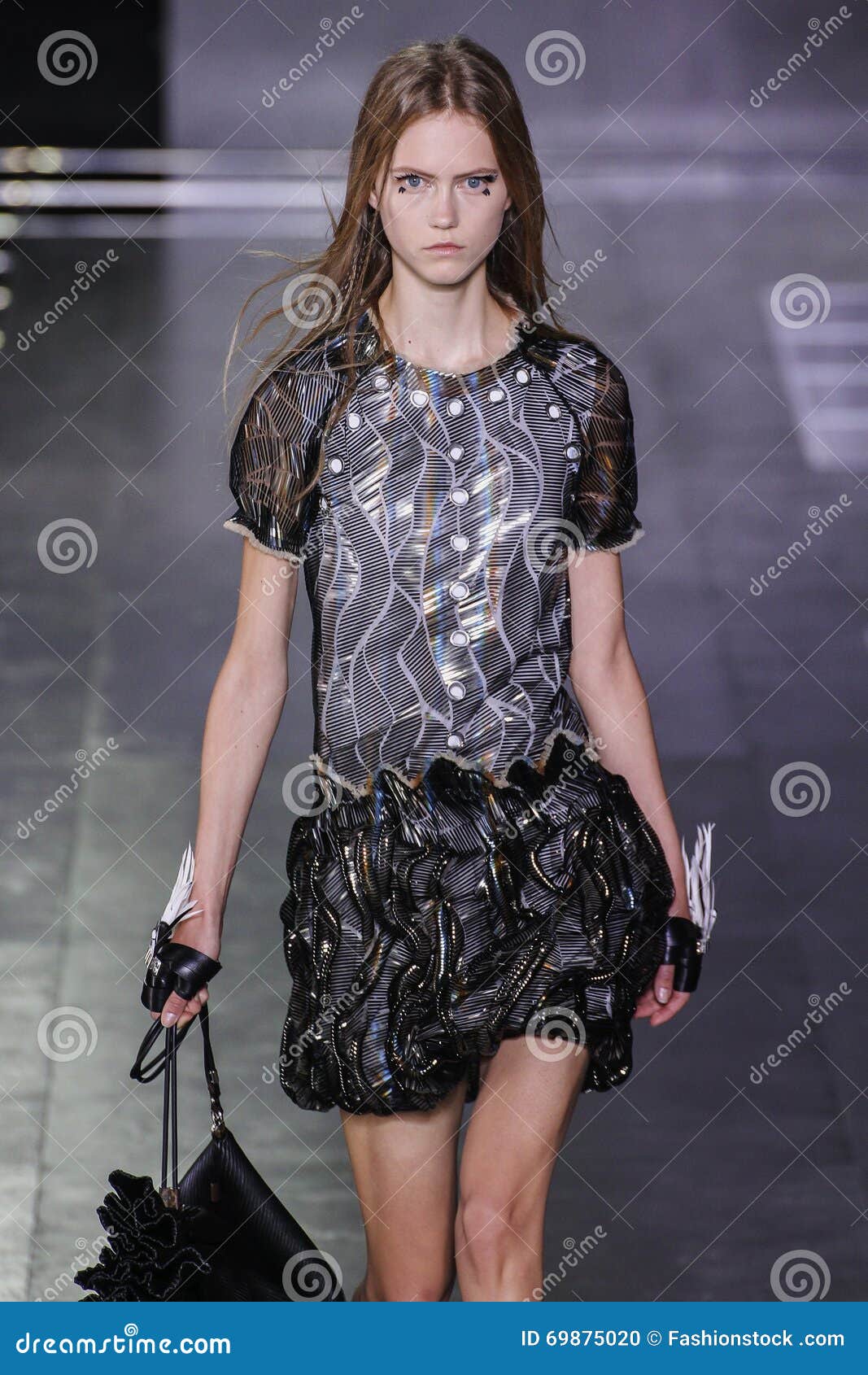 Model walks on the runway during the Louis Vuitton Paris Fashion