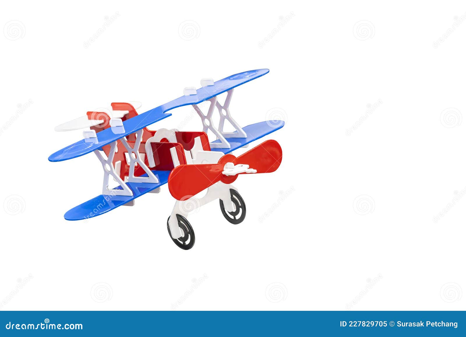 Avion de juguete azul, blanco y rojo