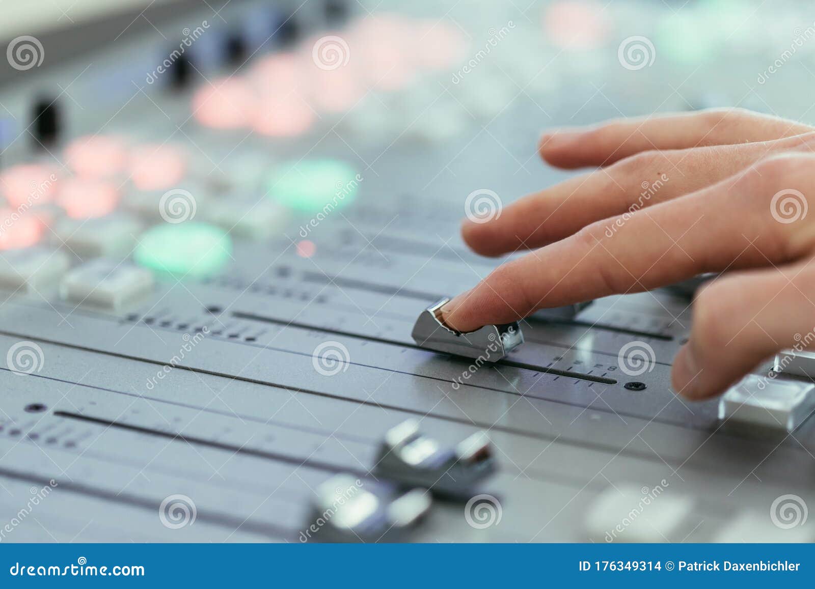 Radio Broadcasting Studio: Moderator is Using the Soundboard, Computer