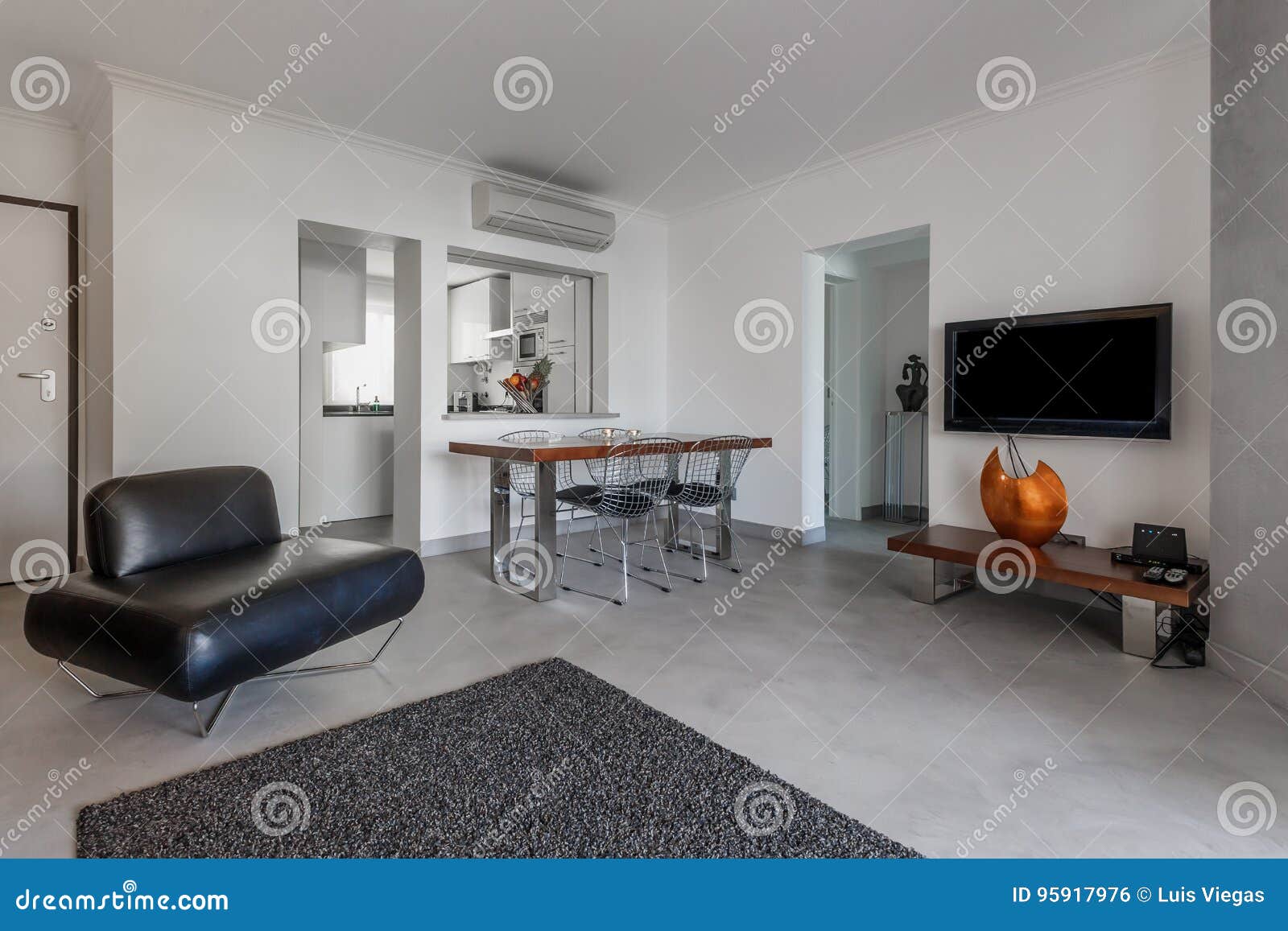 Modern Apartment With White Walls And Light Grey Floor Stock Photo