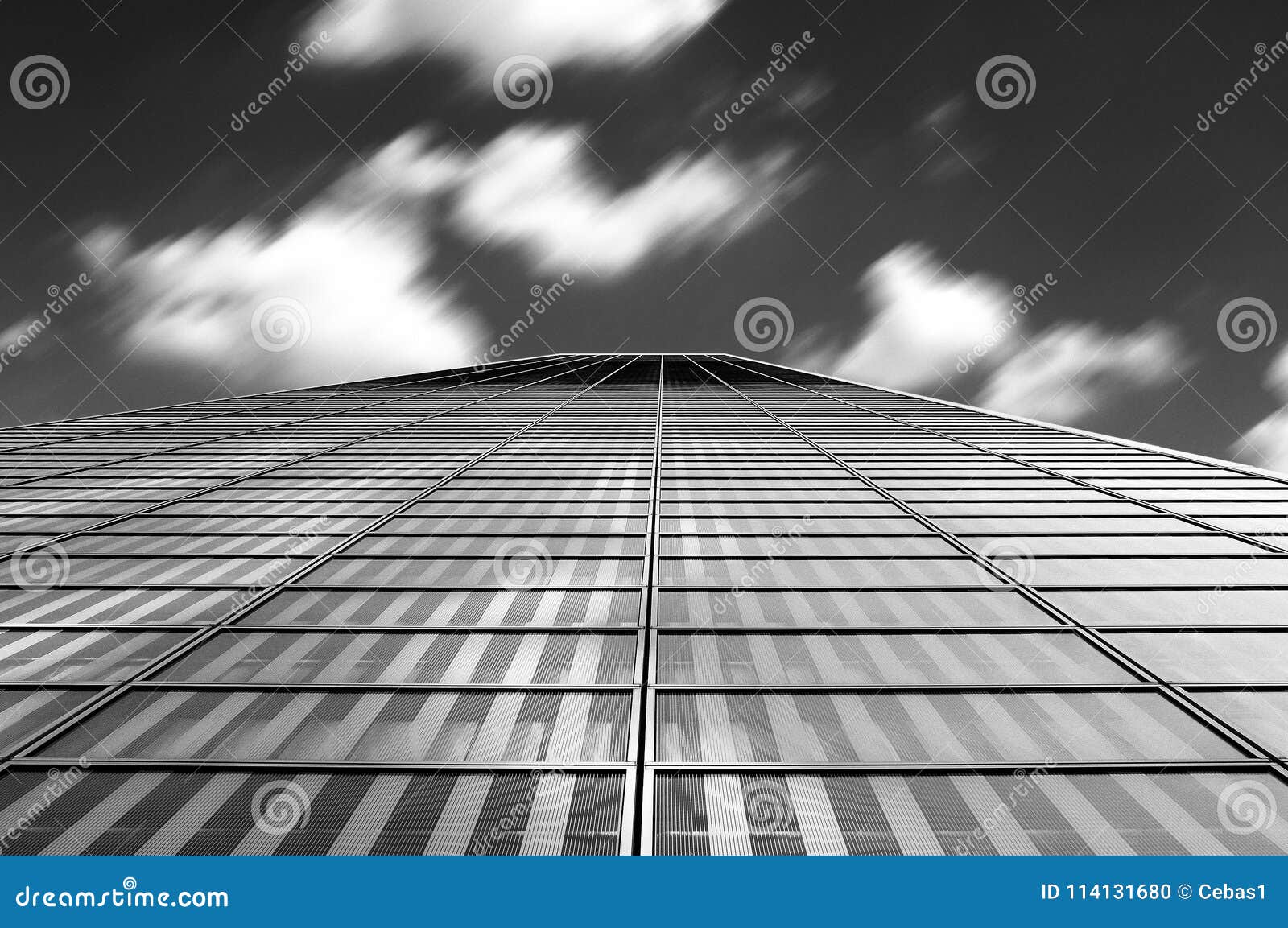 Modern Architecture Abstract with Clouds in Motion Blur Stock Photo