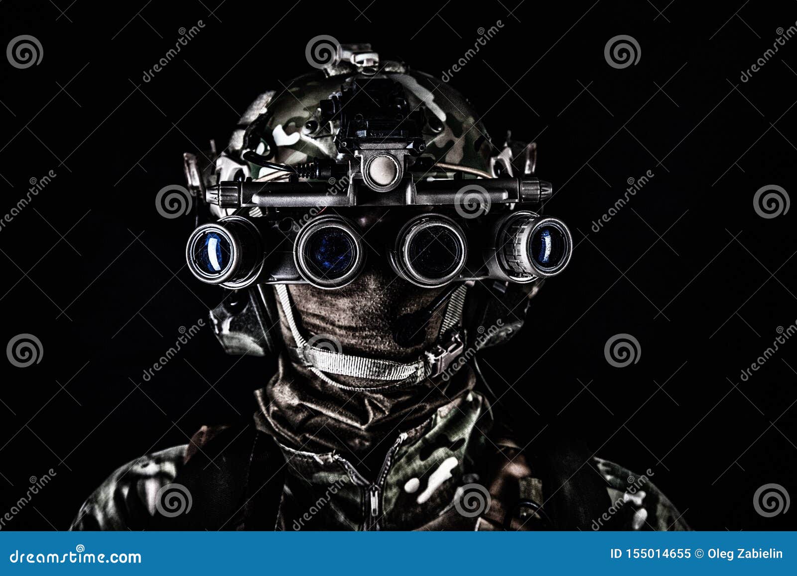 soldier in night view goggles low key studio shoot