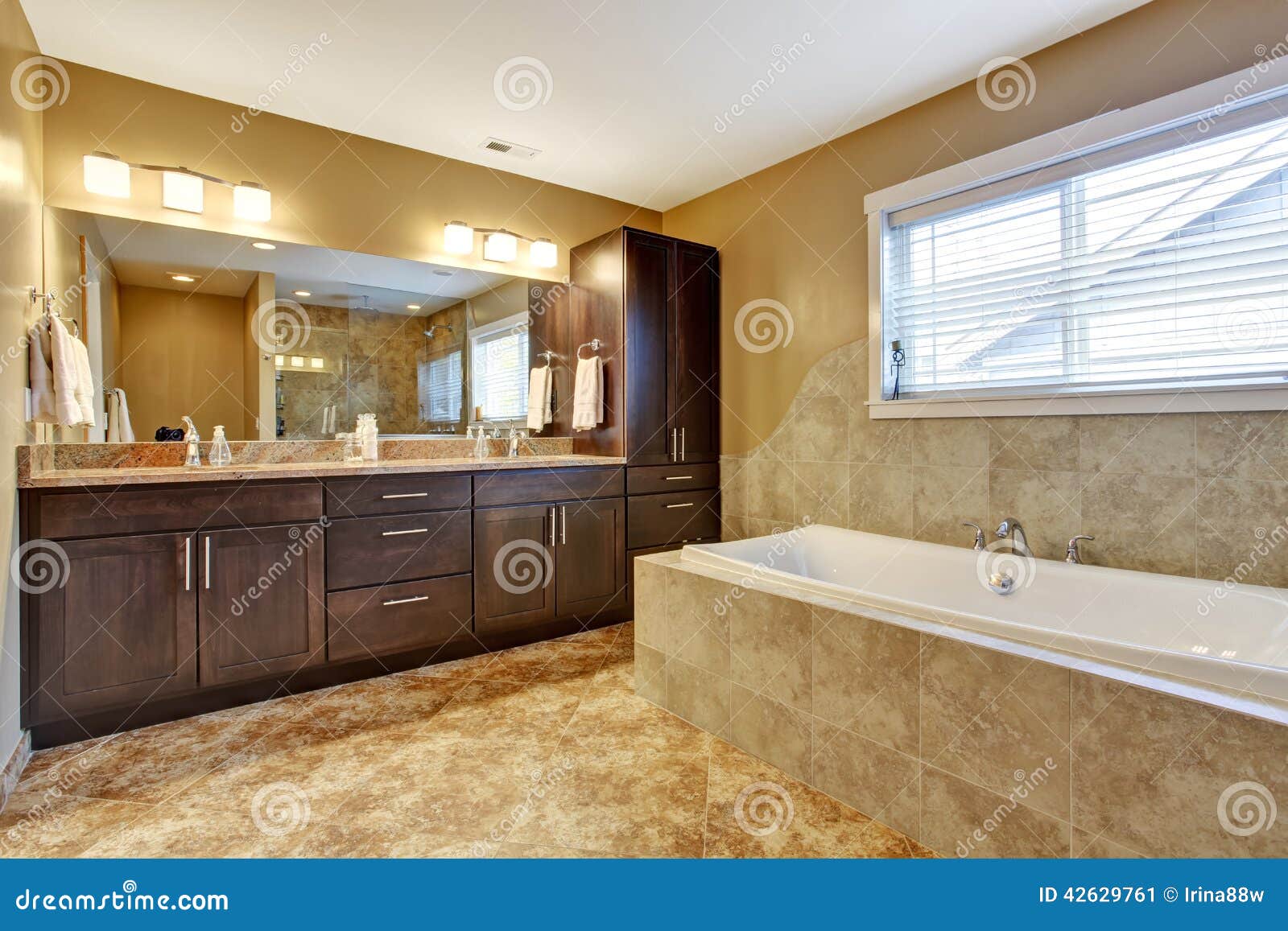 Modern Bathroom Interior With Dark Brown Cabinets Stock