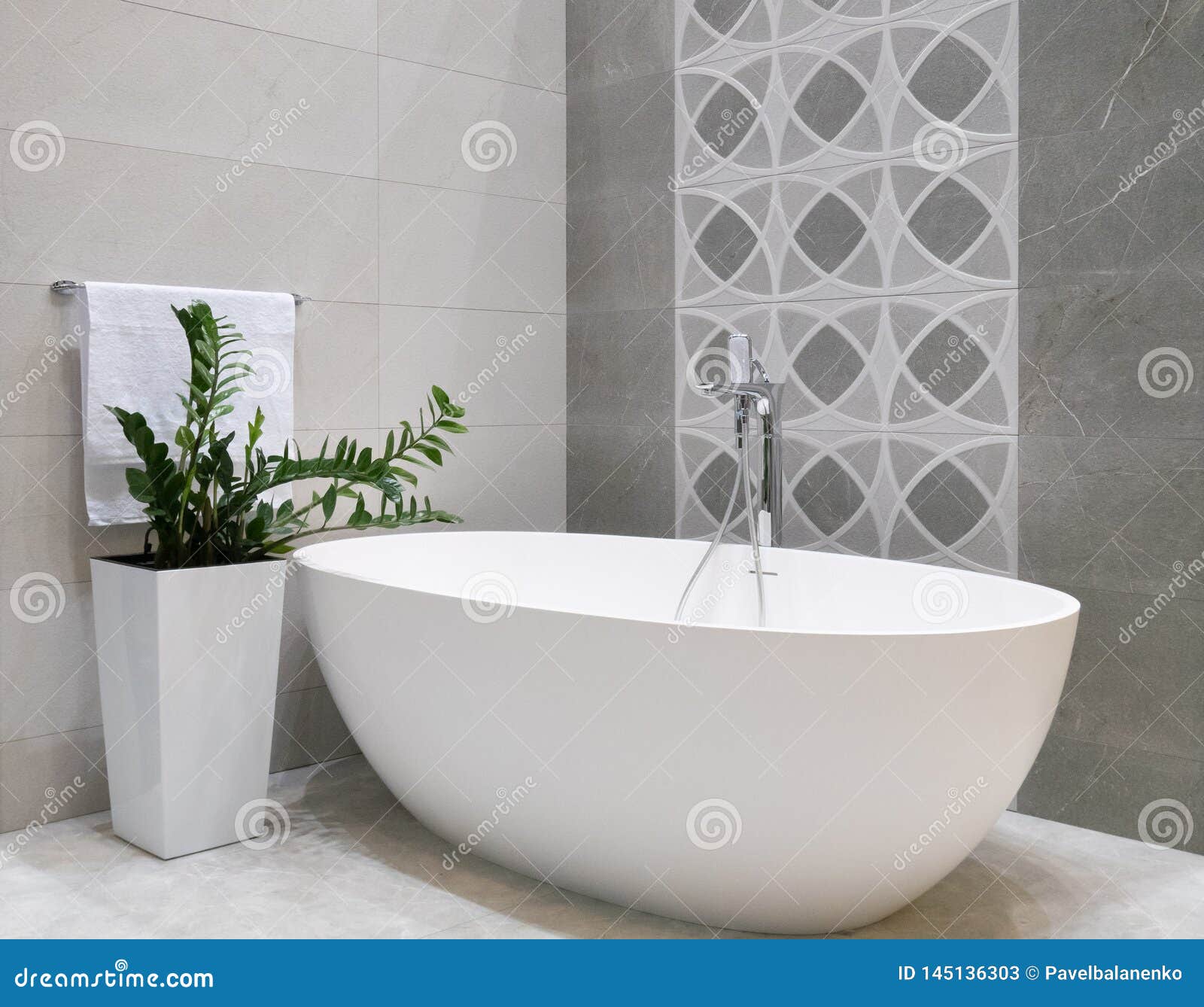 Modern Bathroom Interior Design With White Stone Bathtub Grey