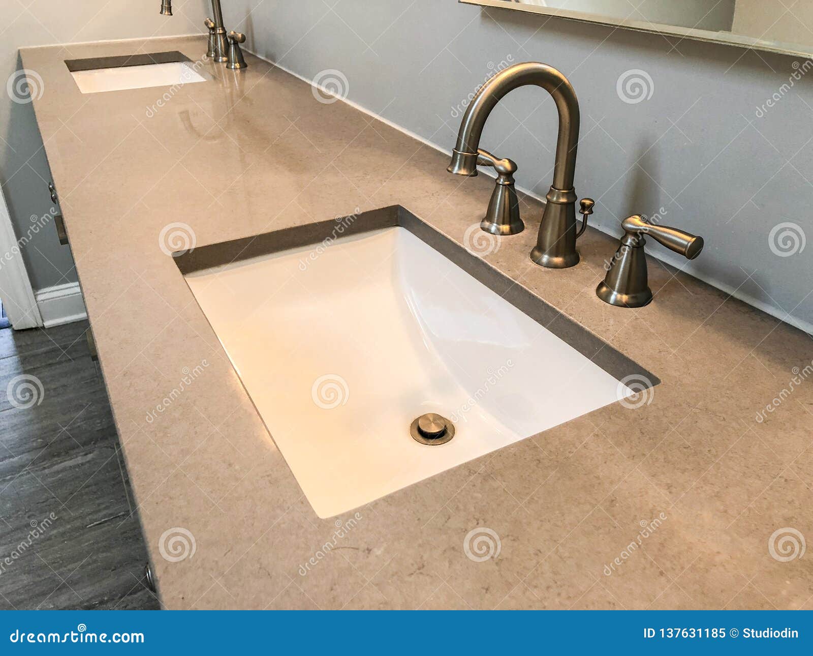 Modern Bathroom With Quartz Countertop Two Sinks And Faucets With