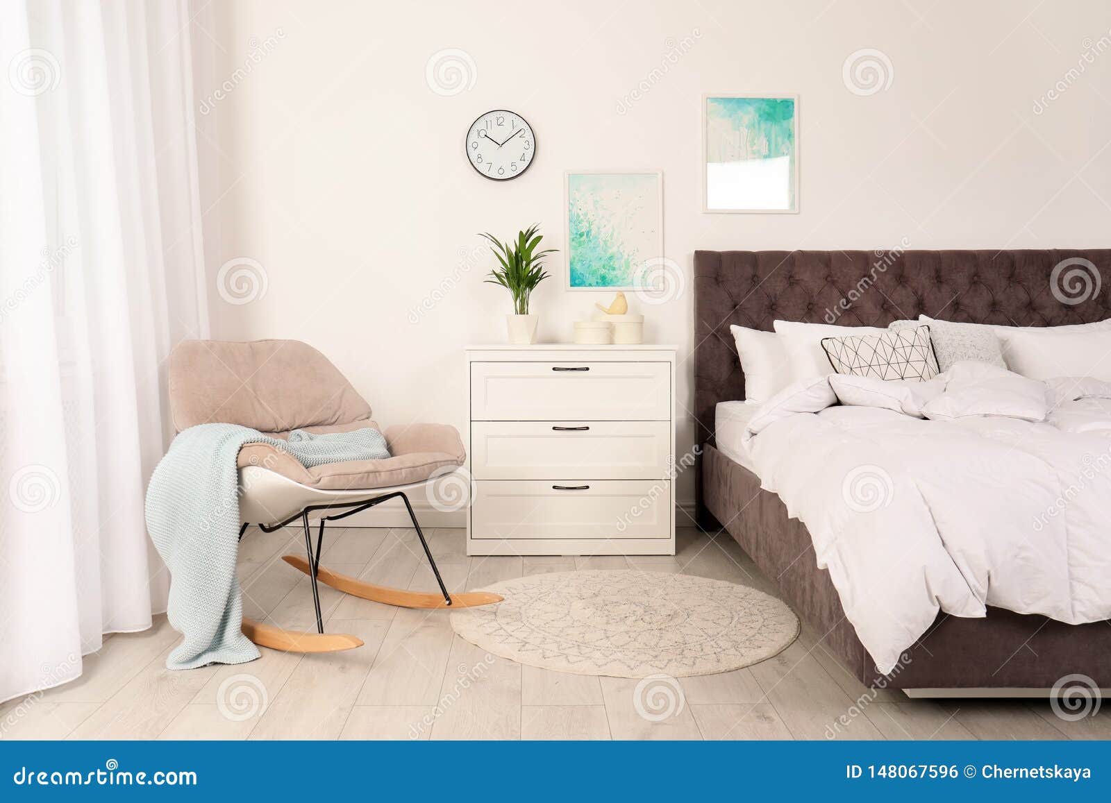 Modern Bedroom Interior With Comfortable Chair Stock Photo