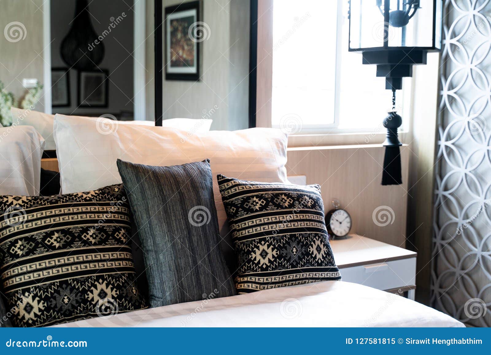 bed with many pillows