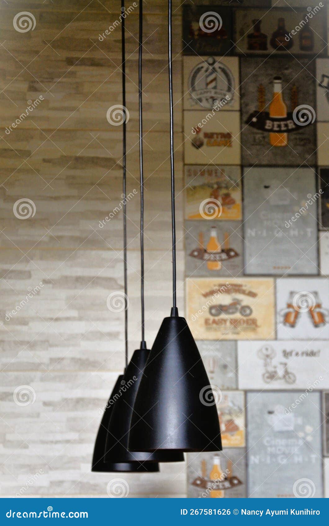 modern black lamps hanging from the ceiling decorating kitchen
