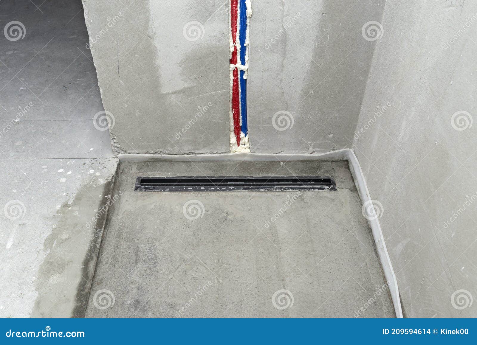 A Modern Black Linear Shower Drain Installed in the Shower Floor