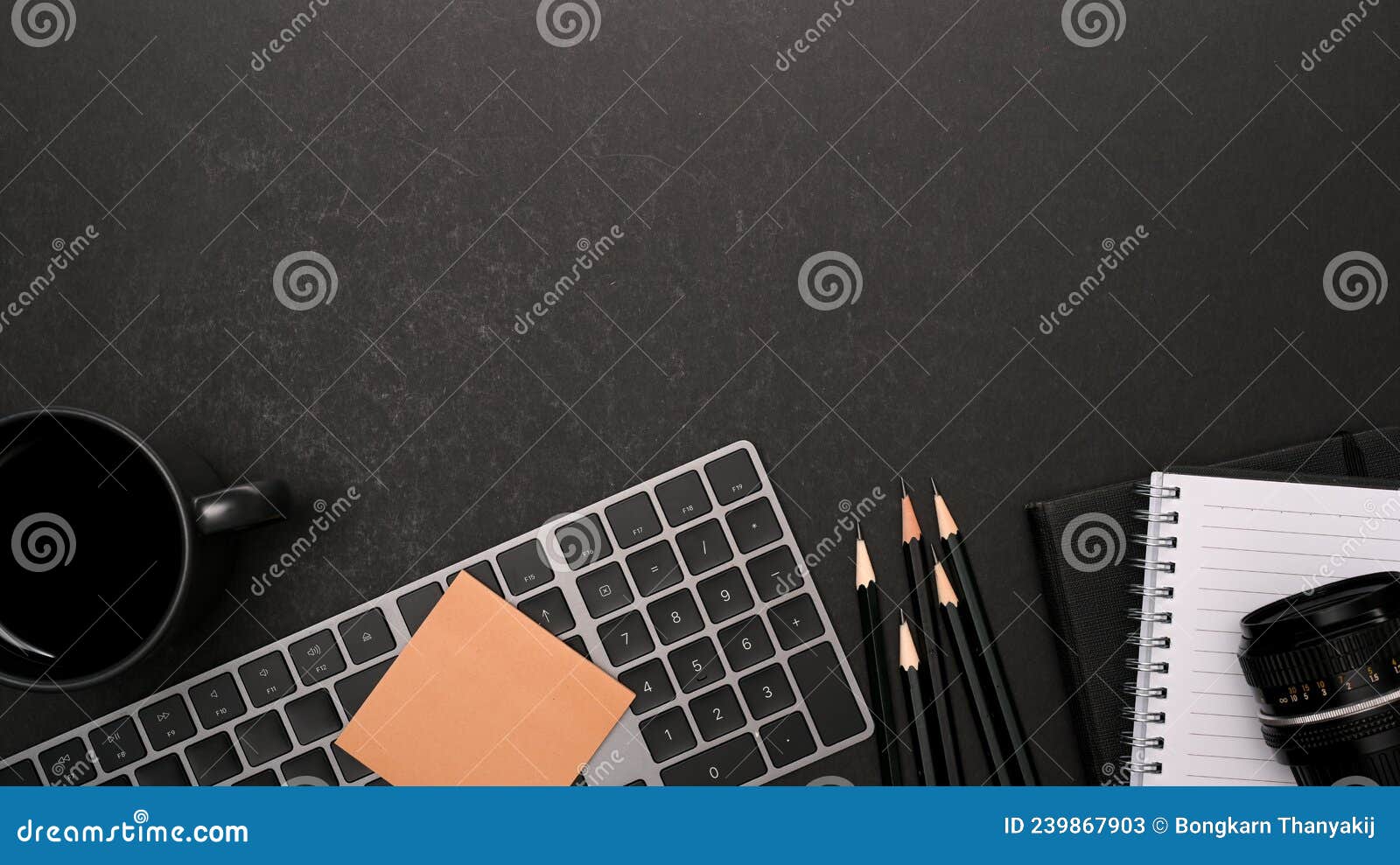 A Modern Black Study Table with Stationery and Copy Space. Flat Lay