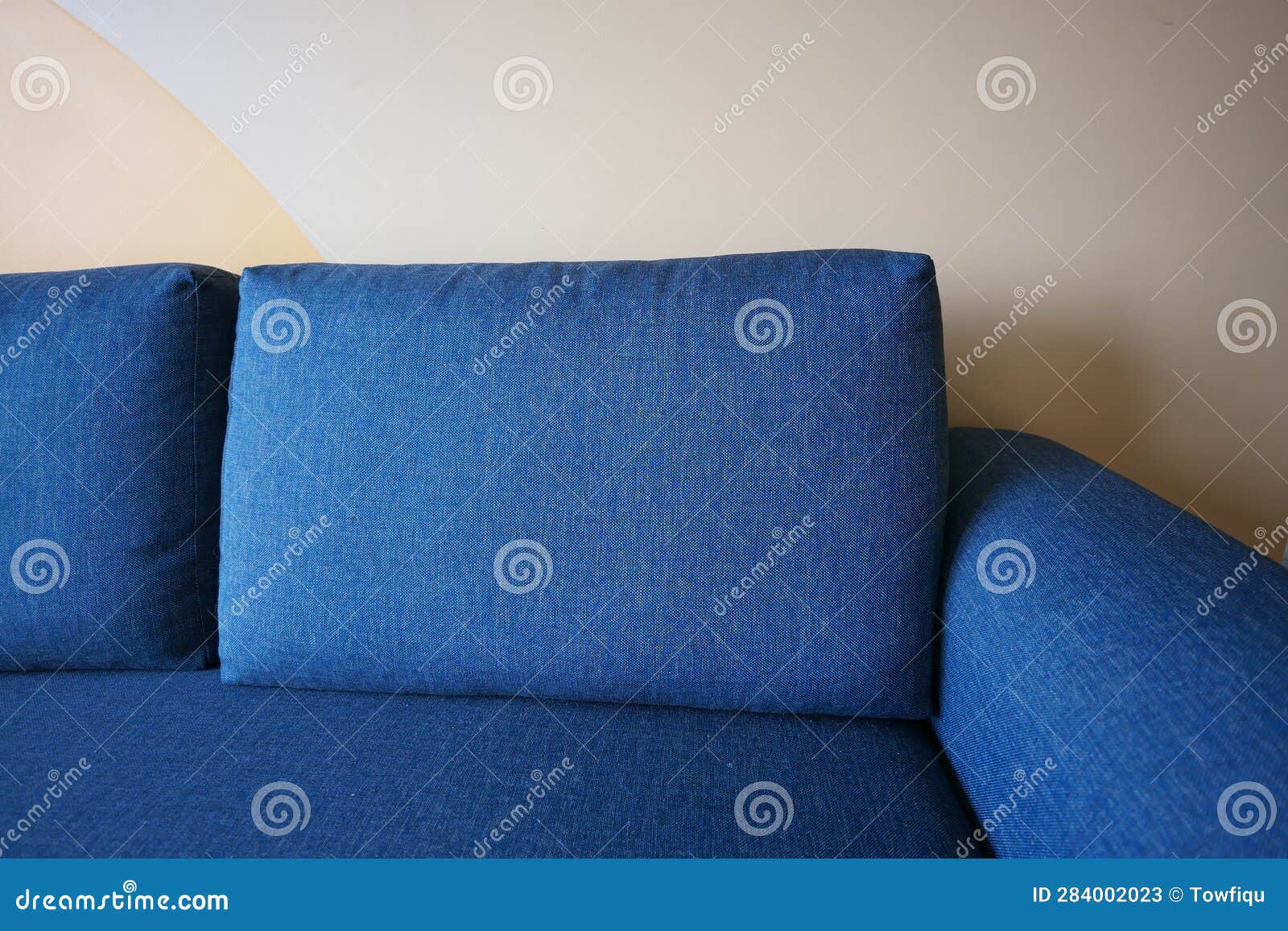Modern Blue Sofa with Pillows in Living Room at Home Stock Image