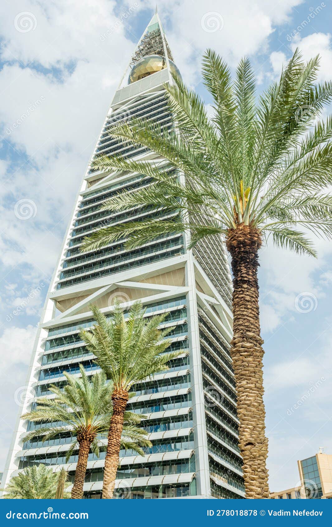modern buildings in the al olaya downtownt district with palms in the foreground, al riyadh