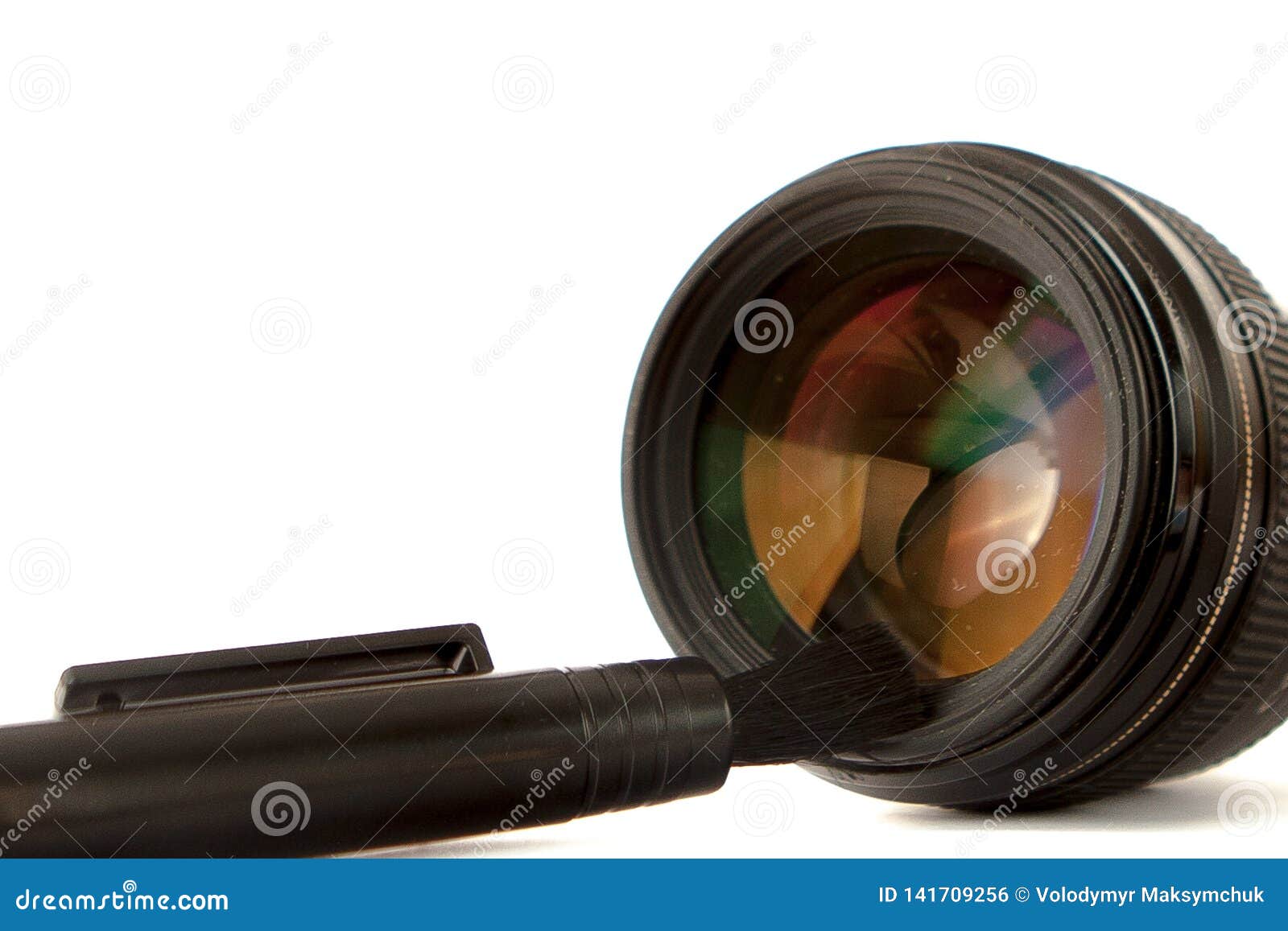 Modern Camera Lens Cleaning with Brush Close Up View Stock Photo
