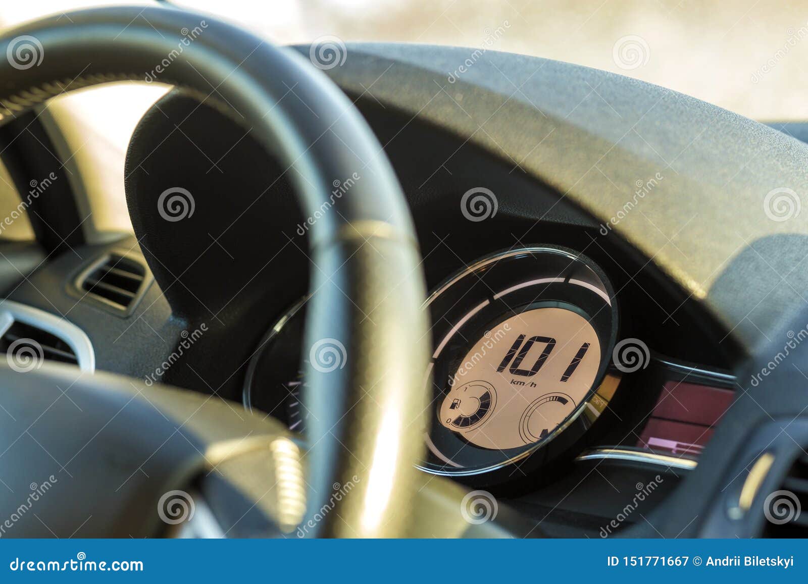 Modern Car Interior with Driver Hand on Steering Wheel. Safe Driving