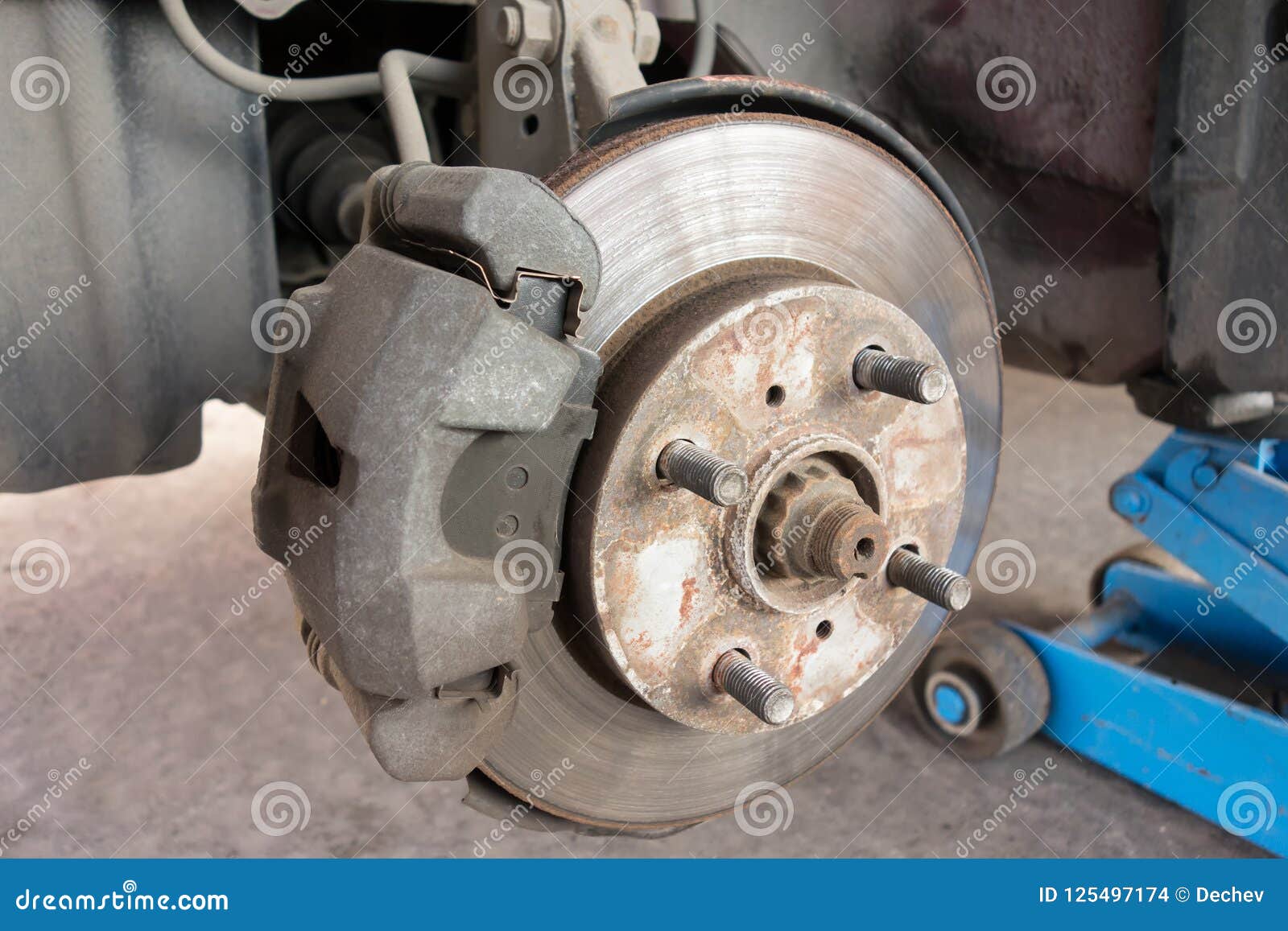 Modern Car Take Wheel Off Show Brake Disk and Caliper Assembly Stock