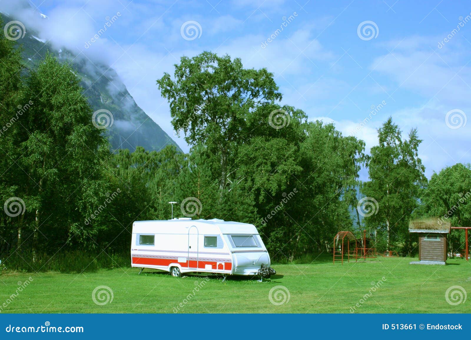 modern caravan at the campsite in the mountains