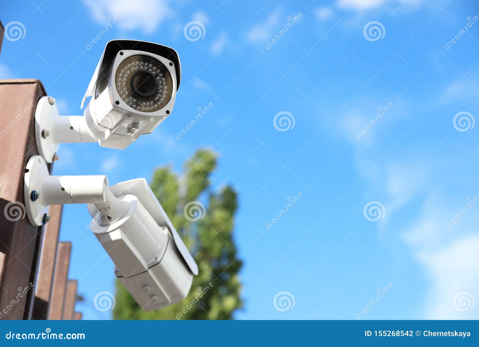 Modern CCTV Security Cameras Against Blue Sky. Stock Photo Image of detector, electronic