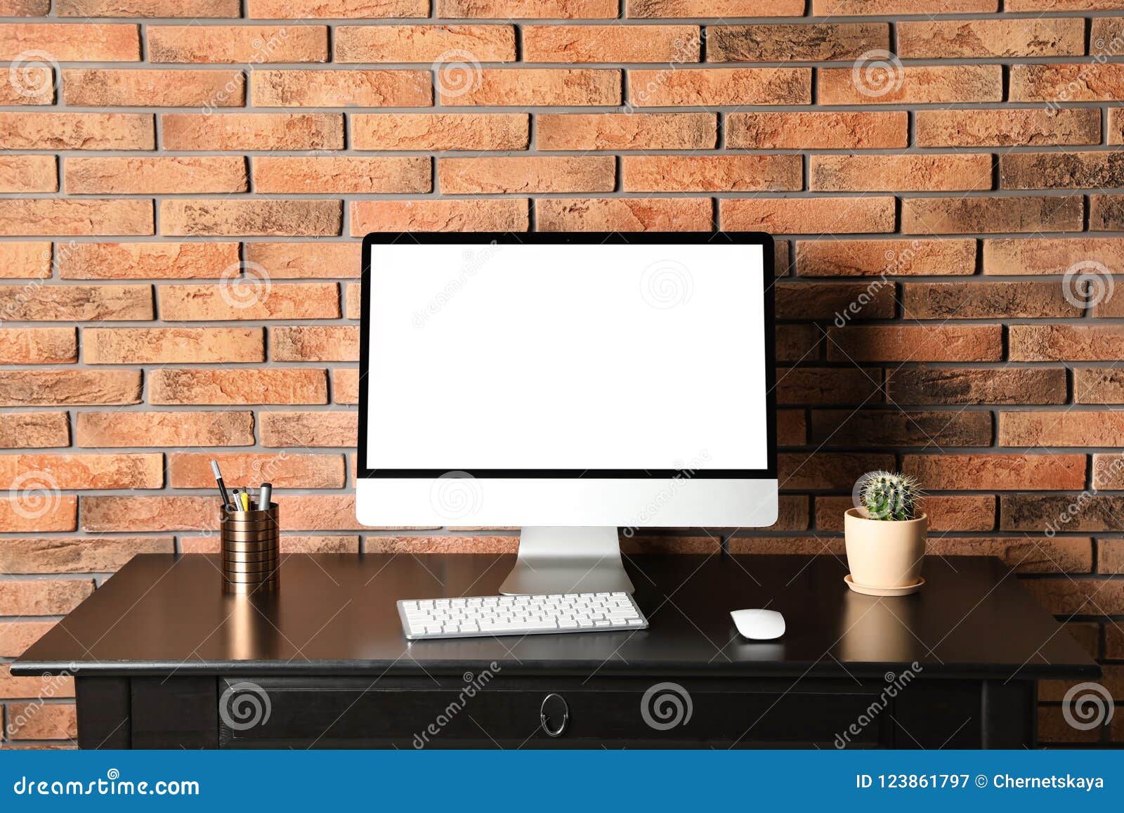 Modern Computer Monitor On Desk Brick Wall Mock Up With Space For