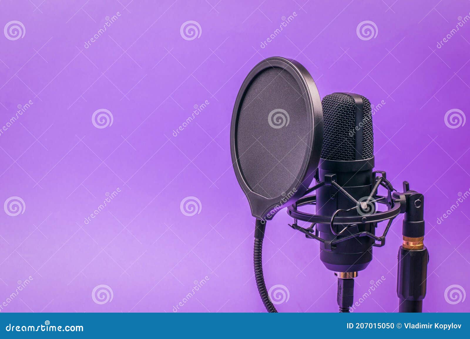 Modern Condenser Microphone on a Stand on a Purple Background Stock ...