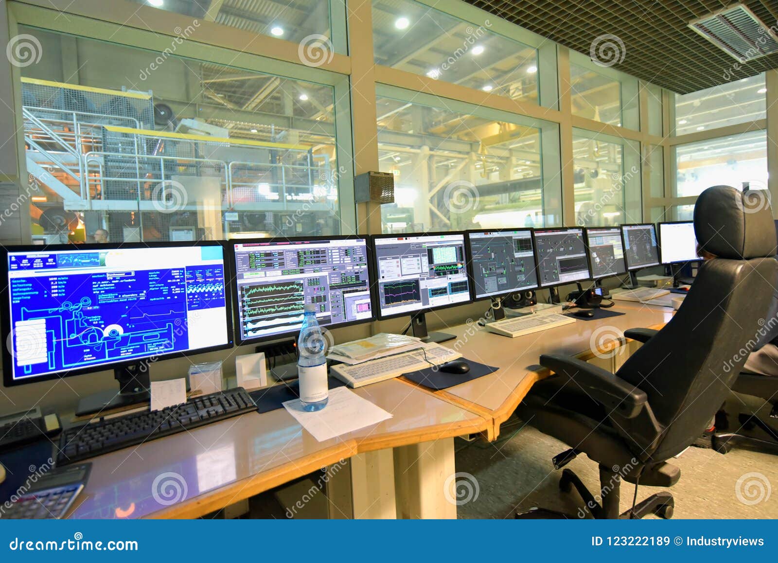 modern control centre with screens for monitoring and operating