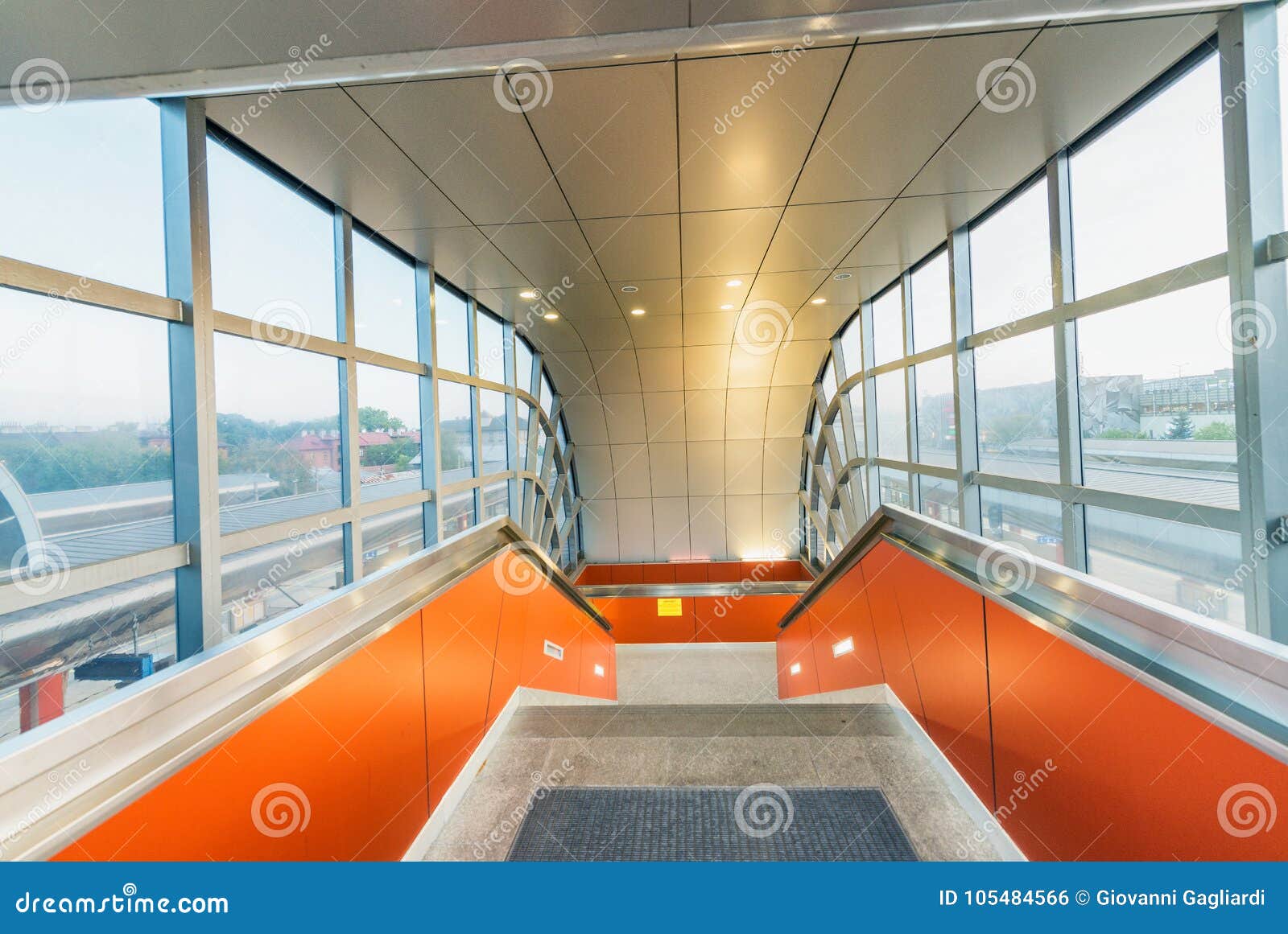 Modern Corridor with Staircase Surrounded by Glass Windows Stock Photo ...