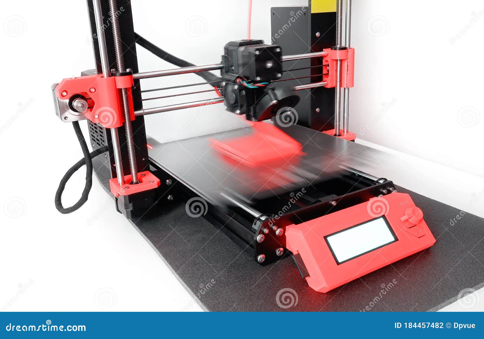 Modern 3D Printer Printing a Plastic Object. Motion Blur Stock Photo