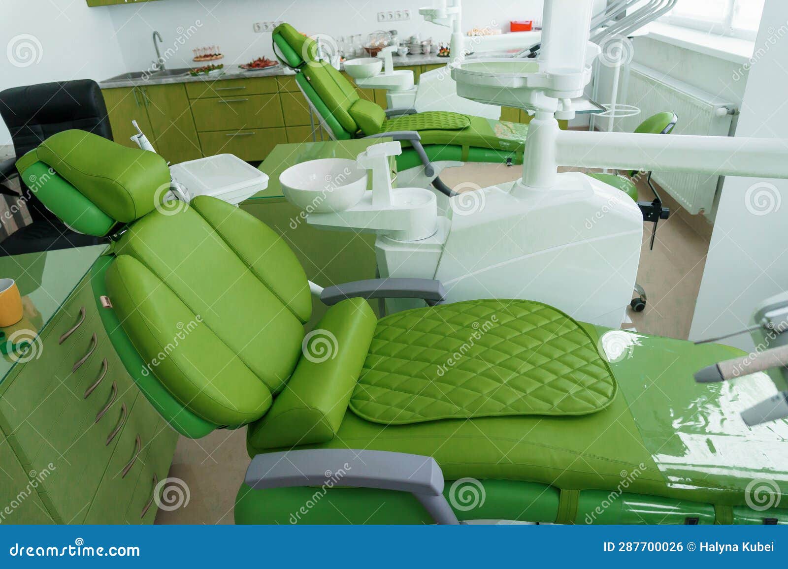 Modern Dental Office in Green. Dental Unit with Dental Instruments