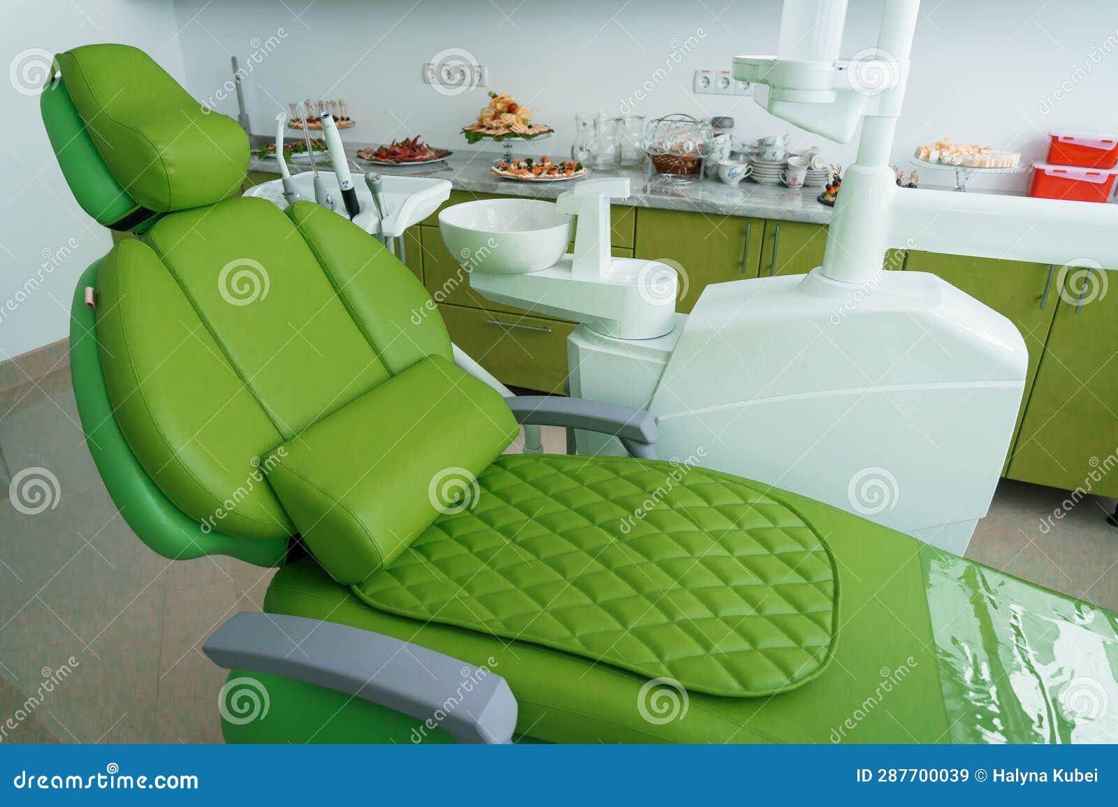 Modern Dental Office in Green. Dental Unit with Dental Instruments