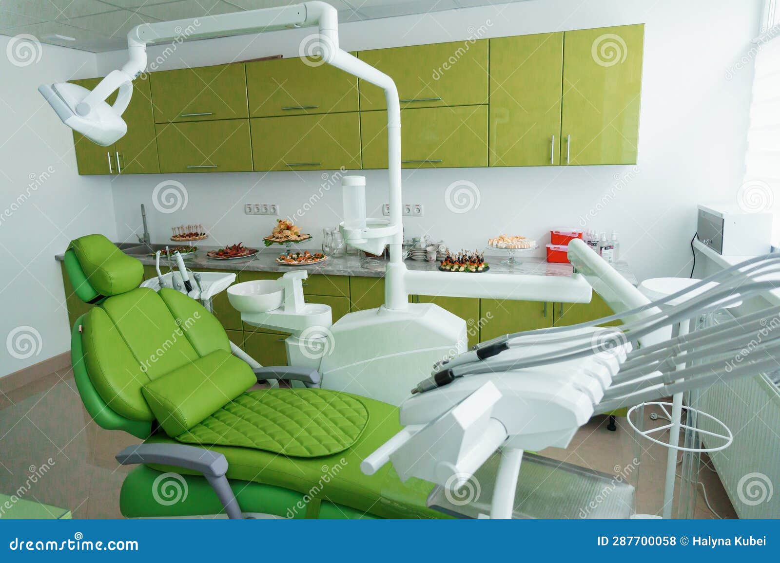 Modern Dental Office in Green. Dental Unit with Dental Instruments