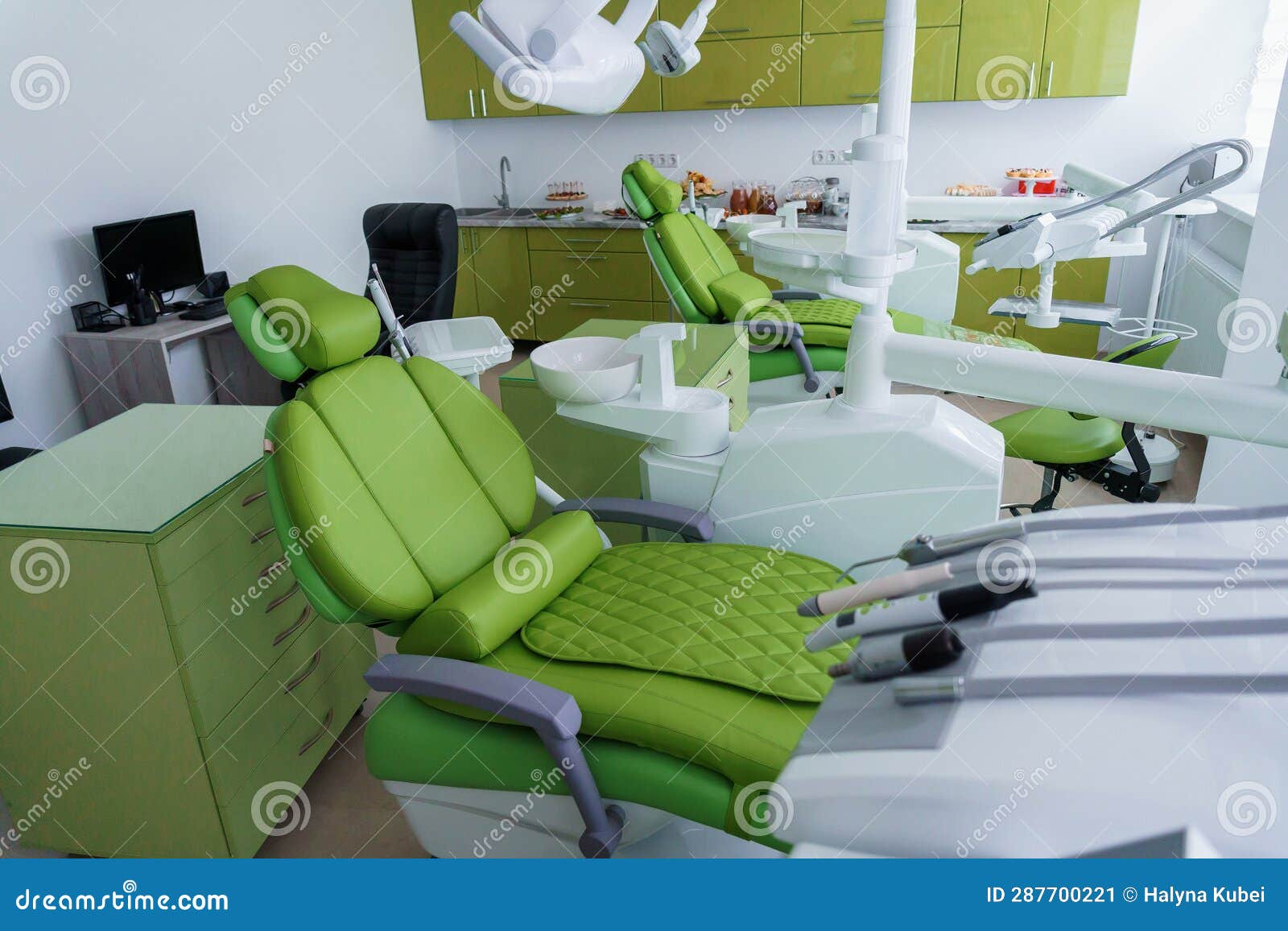 Modern Dental Office in Green. Dental Unit with Dental Instruments