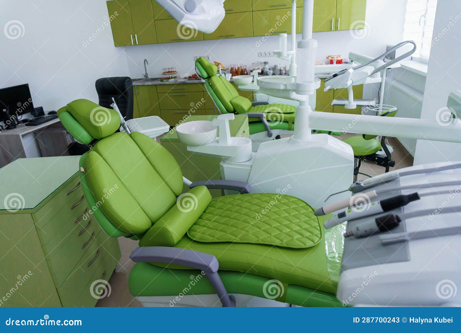 Modern Dental Office in Green. Dental Unit with Dental Instruments