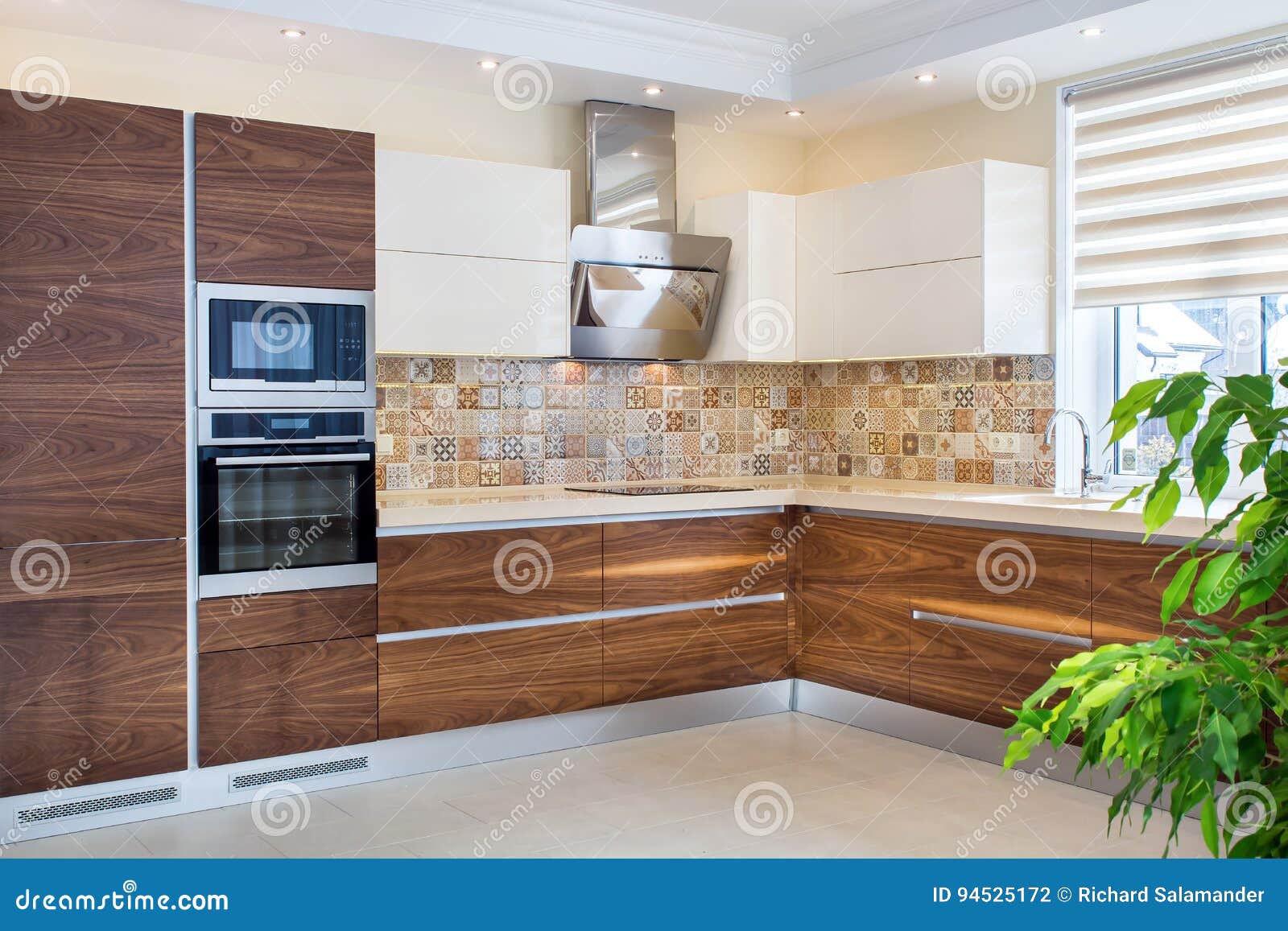 Modern Design of the Kitchen in a Light, Bright Interior. Stock Photo