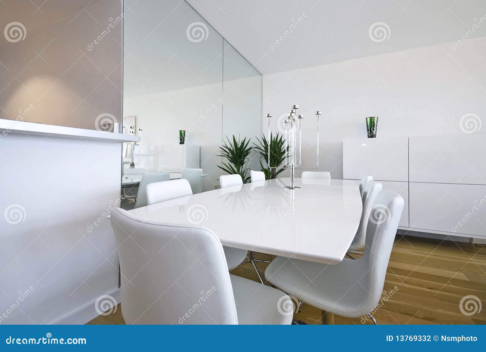 modern dining area with massive white table