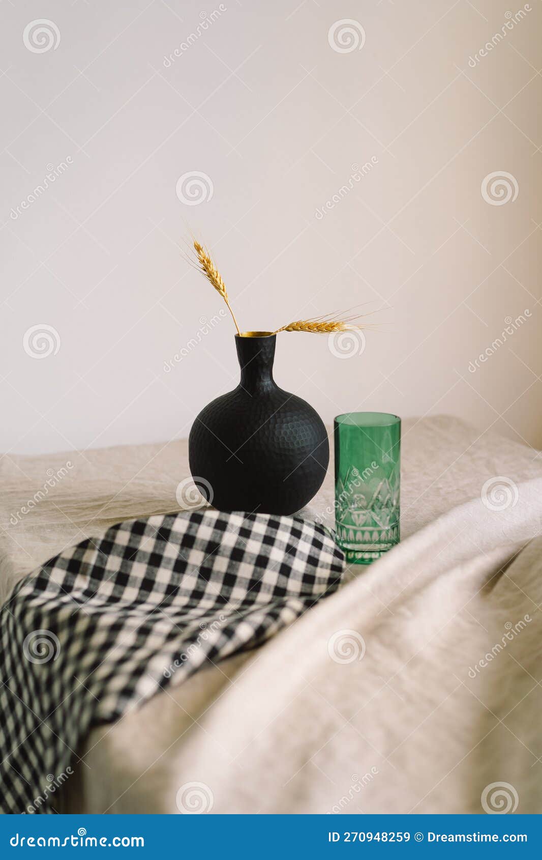 Modern Dining Table Setting. a Beautiful Black Vase with a Linen Napkin ...