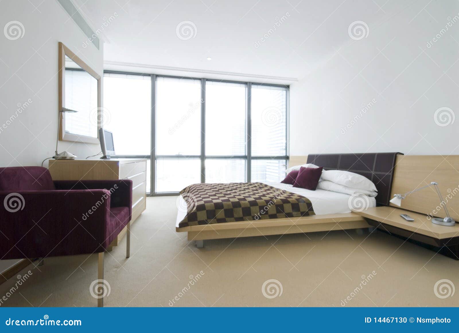 double bedroom with king size bed and contemporary designer furniture