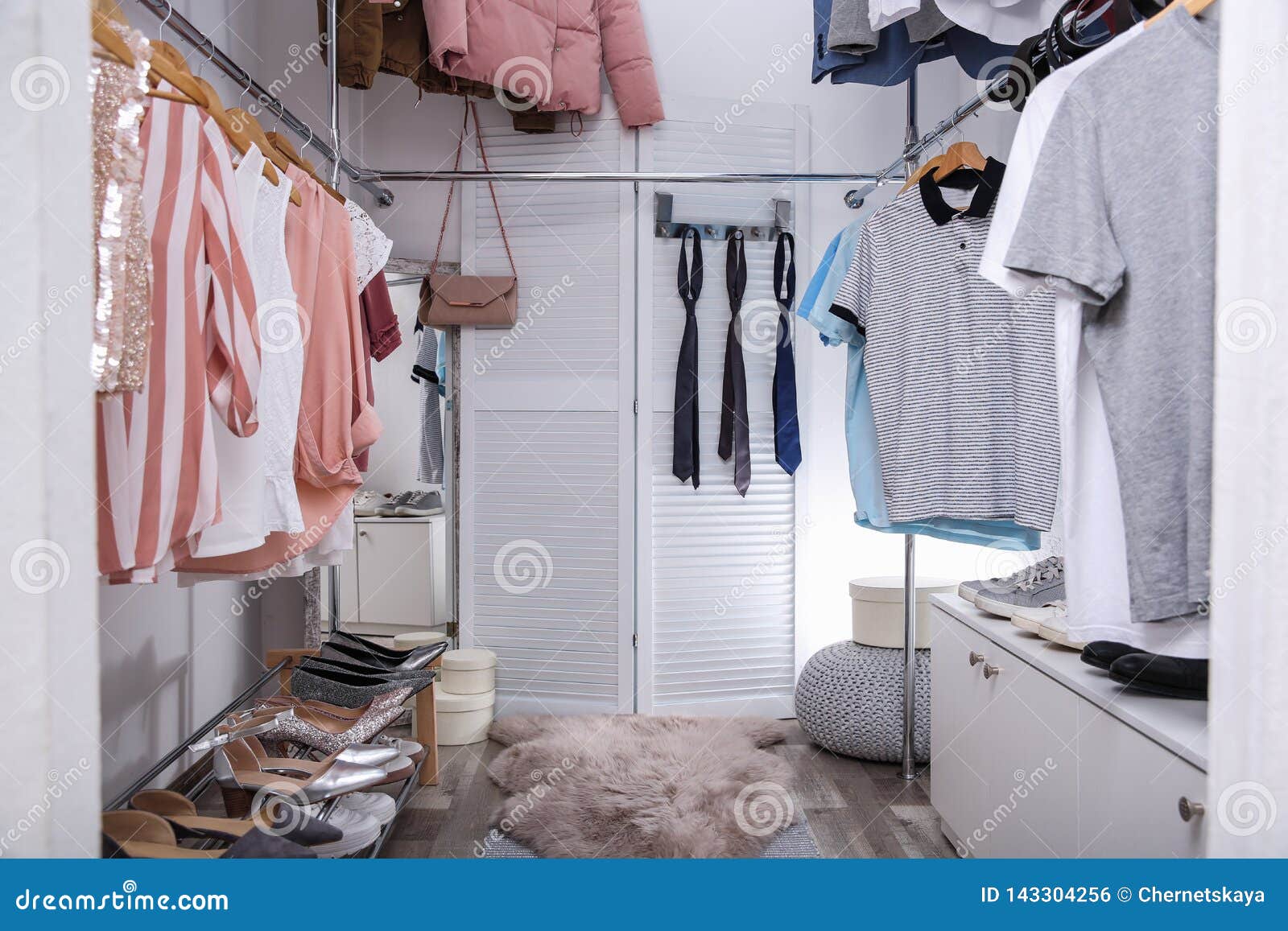 Dressing Room with Different Stylish Clothes and Accessories Stock