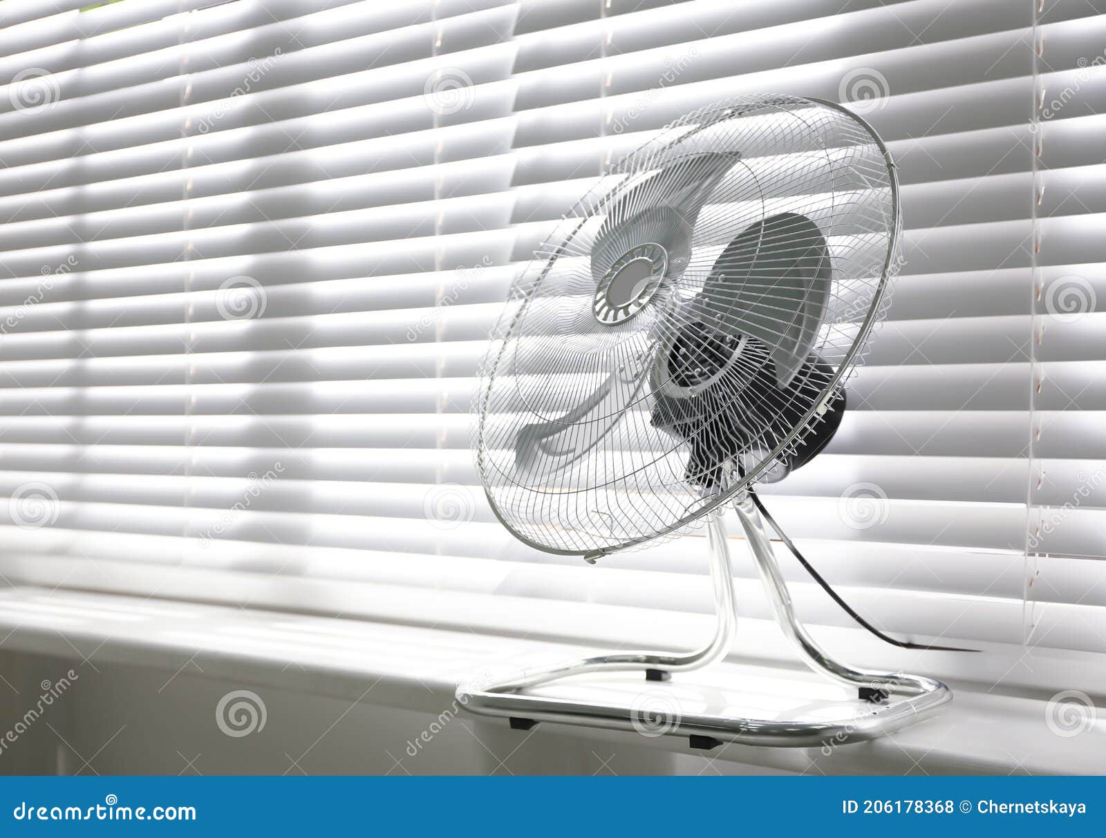 Modern Electric Fan on Window Sill Indoors. Space for Text Stock Photo Image of appliance