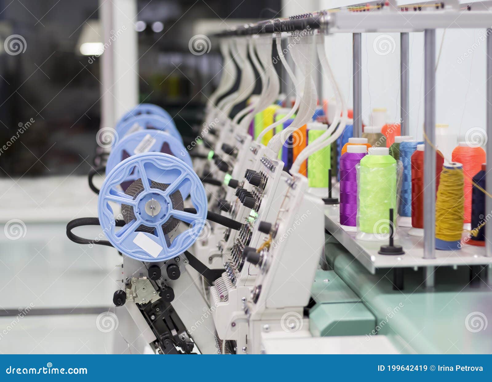 Modern Embroidery Machine with a Device for Sewing Sequins and Colored