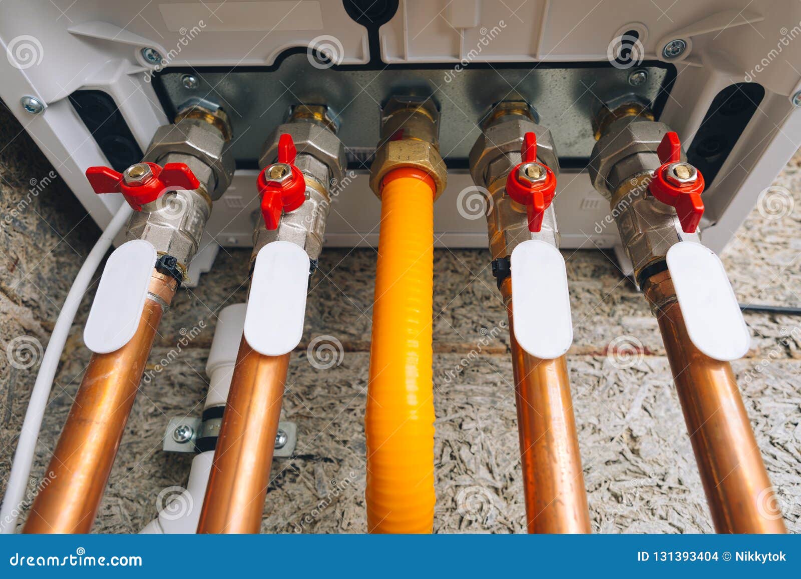 modern gas boiler bottom piping, independent heating system, close-up view