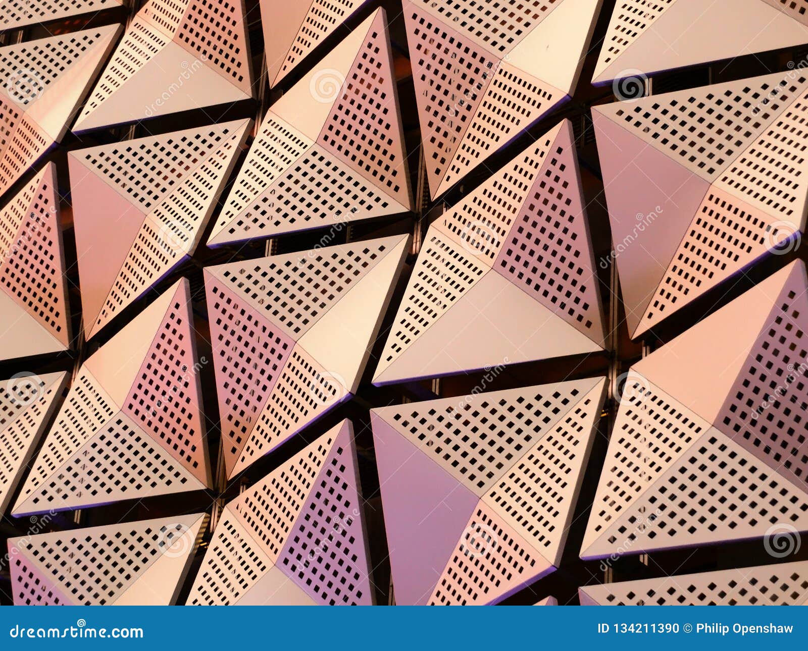 Modern Geometric Steel Cladding with Angular Patterns Stock Photo