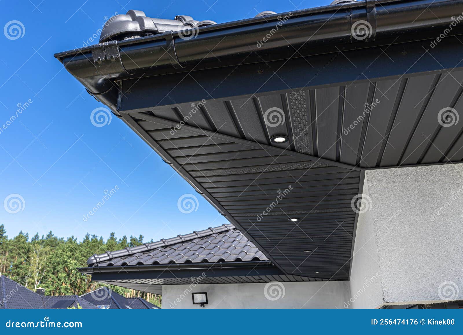 A Modern Graphite Herringbone Roof Lining is Attached To the Trusses